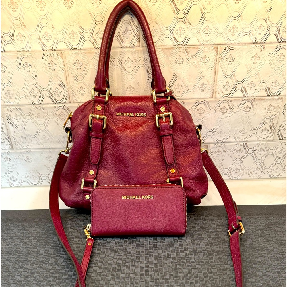Luxury Michael Kors burgundy bag and wallet. Purse 9x 12. Wallet 3 1/2 x 6 1/2